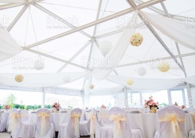 an image of tables setting at a luxury wedding hall - wide angle view