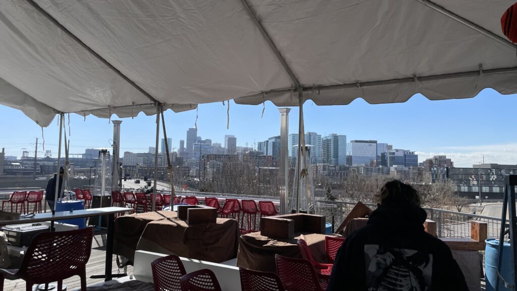 Avanti Food and Beverage Event Tent with view of Denver