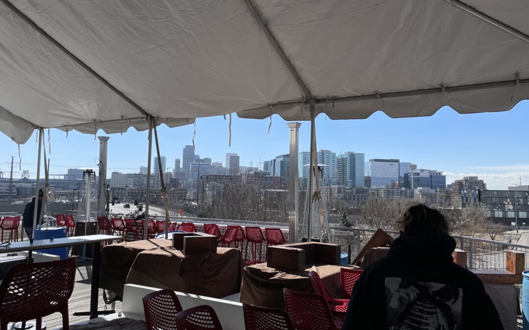 Avanti Food and Beverage Event Tent with view of Denver